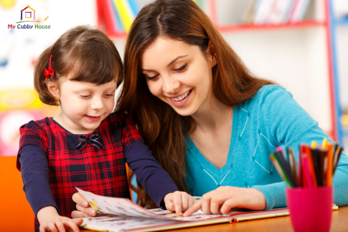 reading with preschoolers - my cubby house child care centre gold coast 1 (700 × 467px)